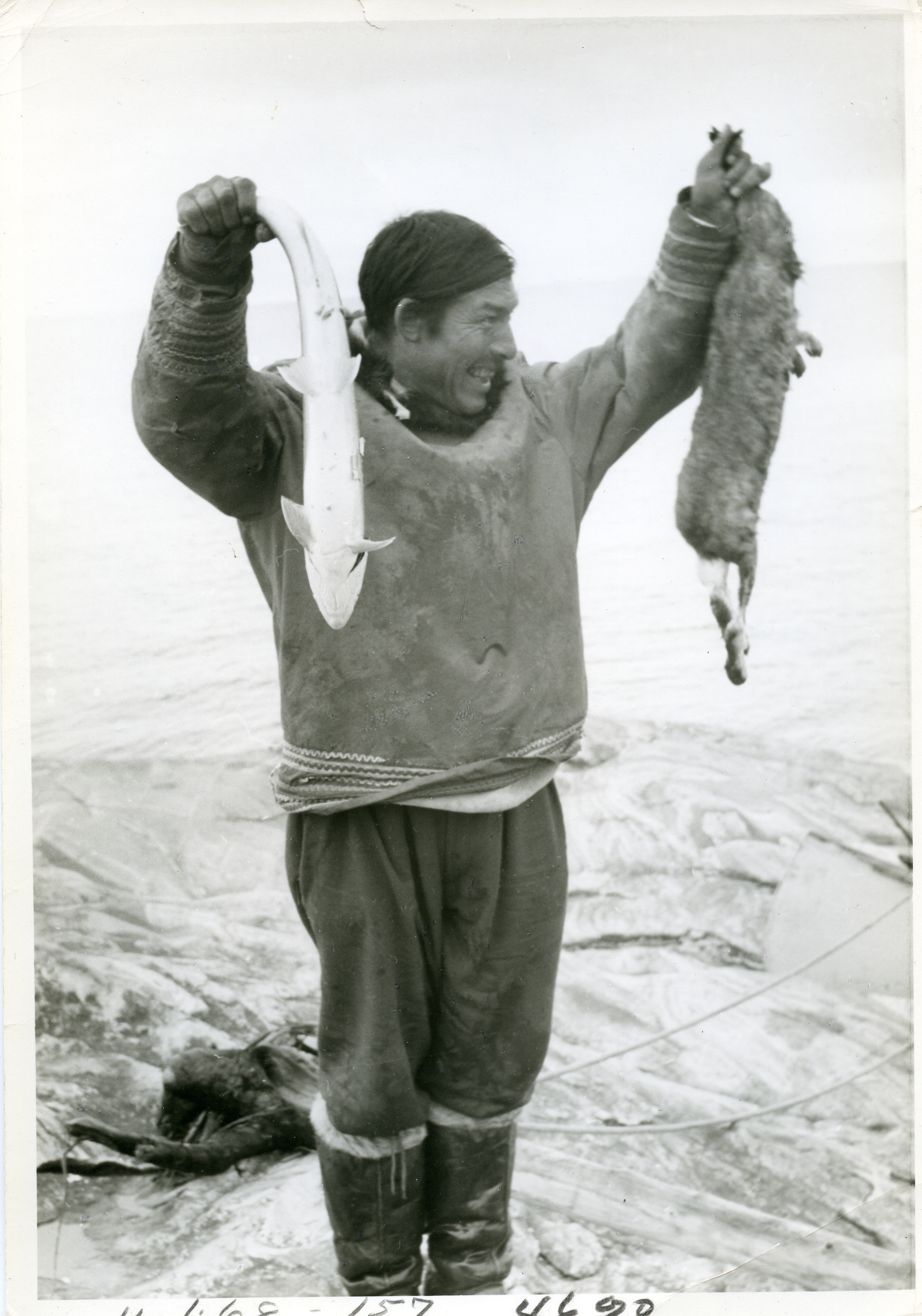 Stan Annanak with fish and hare