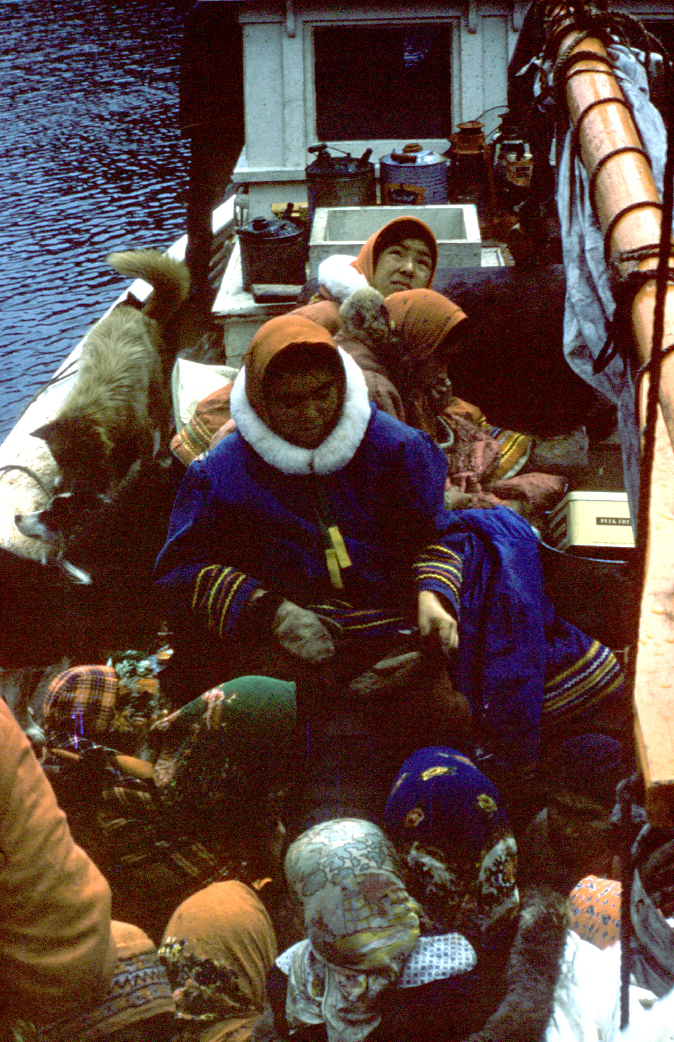 People, dogs, supplies all crammed onboard to support the Port Burwell char fishery, 1960