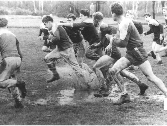 Photograph of students playing rugby, 1948.